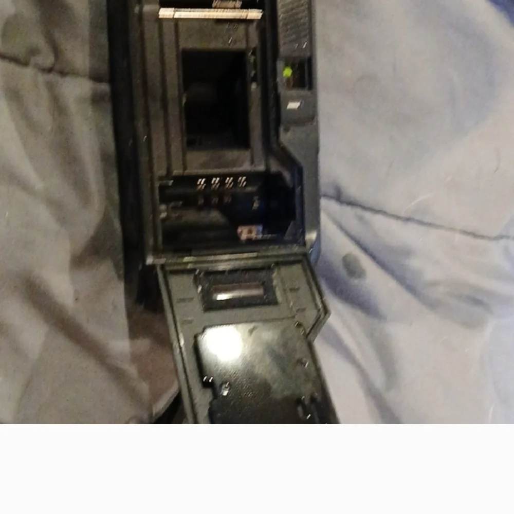 Nikon Black Film Camera with Red Accents